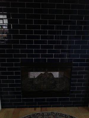 Kitchen side with navy glass tile.