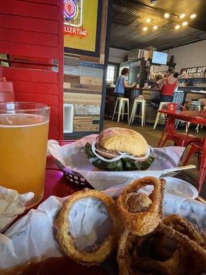 Burgers and onion rings, topped off with a cider!