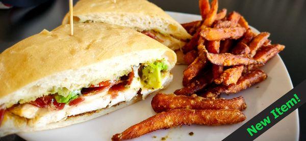 NEW ITEM. Pesto Chicken Sandwich. chicken Breast, House-Made Pesto sauce, Swiss Cheese, Tomatoes, Bacon, Avocado, Bakery-Ciabatta Bread