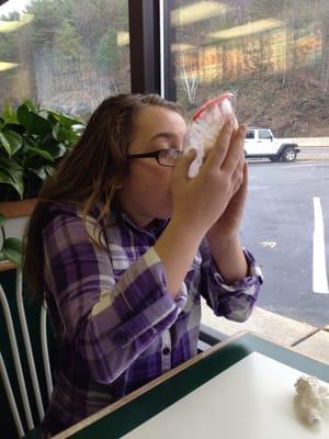 Hannah finishing her banana split!