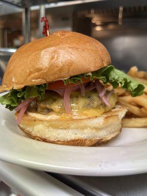 ATX Classic: 1/3 lbs all Texas Beef, Tillamook Sharp Cheddar, Classic Sauce on a Potato Bun - with Herbed Fries.