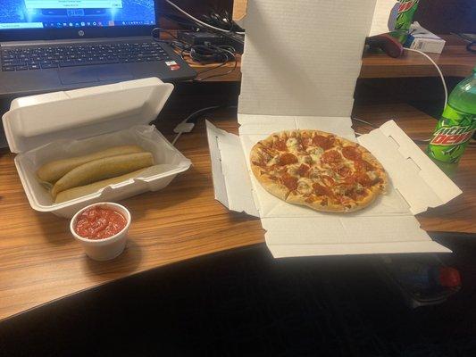 Pepperoni and sausage pizza 10 inch three Bosco sticks with really good sauce