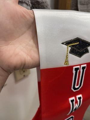 Graduation stole  You can clearly still see the stain mark next to the little cap And "U"