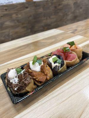 Yubu (from left to right) beef, spicy pork, shiitake mushroom, ahi tuna, salmon