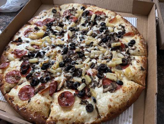 Create your own pizza. Creamy garlic sauce, pineapple, pepperoni, mushroom and olive.