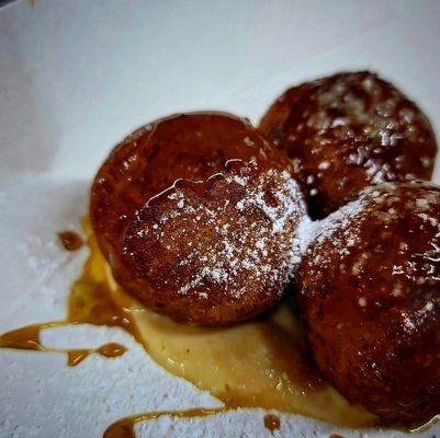 sweet plantains hush puppies with mozzarella cheese and caramel rum sauce