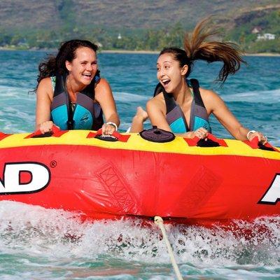 Hold tight and get ready for fun ride! Bumper Tubing on Oahu.