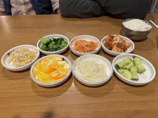 Sides. They will bring more if you ask. We loved the kimchi.