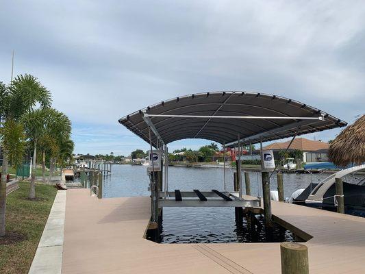 Congratulations to Guy in SW Cape Coral on his new I-Beam Dominica style boatlift cover in timber color.