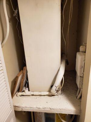 this is the AC and water heater very dirty closet