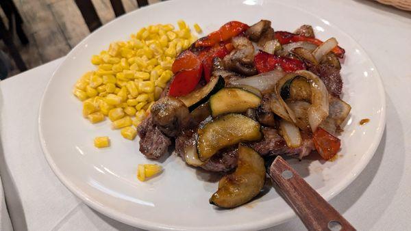 Ribeye steak with sides of corn and cream spinach (not depicted). Steak was passable but wouldn't get again