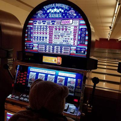 You can play slots and watch people bowl! You can smoke/vape in the Alley Cat Lounge, too.