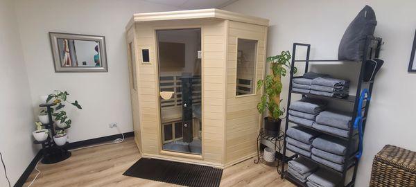 Sauna Room #2 allows one to experience the benefits of infrared sauna combined with red light therapy inside the cabin.