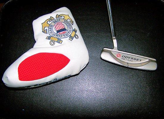 My $9.95 Odyssey DF-550 putter from Play It Again Sports with my prized USCG putter headcover!