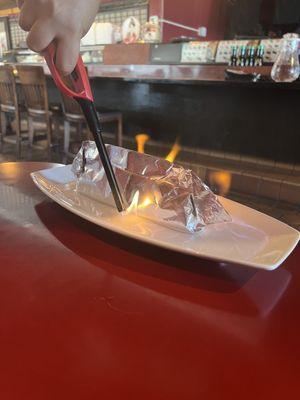 Waitress lighting the Flaming Dragon on fire!