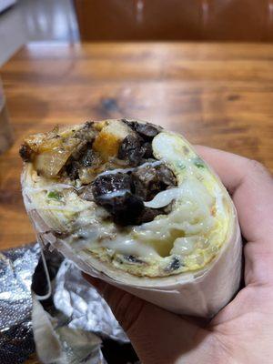 Carne asada Breakfast Burrito with potatoes