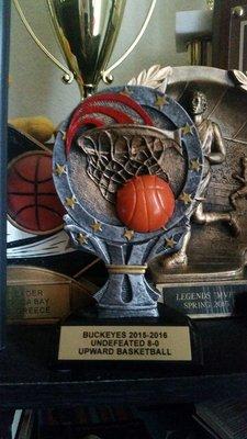 Last years trophy for gradeschool boys basketball team.