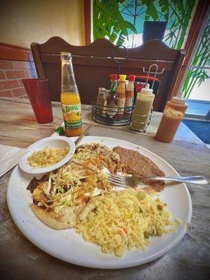 Two pupusas combo and Boing mango drink.