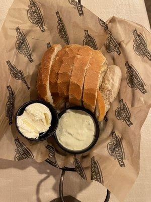 On the house, freshly baked bread with whipped butter and avocado ranch!