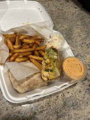 Buffalo Caesar wrap with Cajun fries