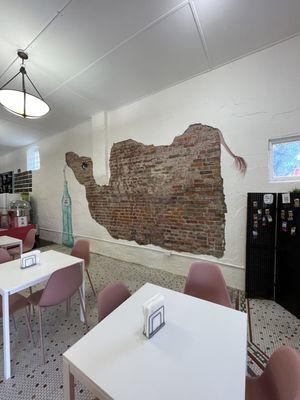 Sitting area and exposed brick wall