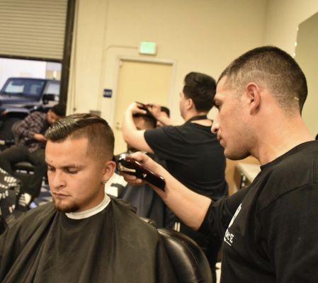 One of the barbers their named Kevin. Awesome work, knows how to keep the client entertained with a good interaction.