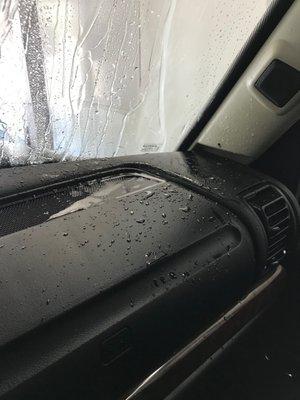 Leak from front windshield while going through car wash. Day 1.