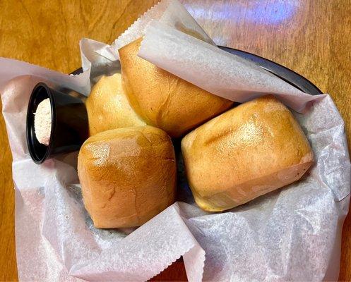 Yummy, warm, fresh baked rolls and honey butter