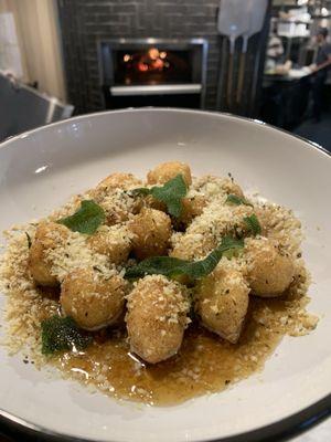 Asiago stuffed gnocchi with sage brown butter and pecorino cheese