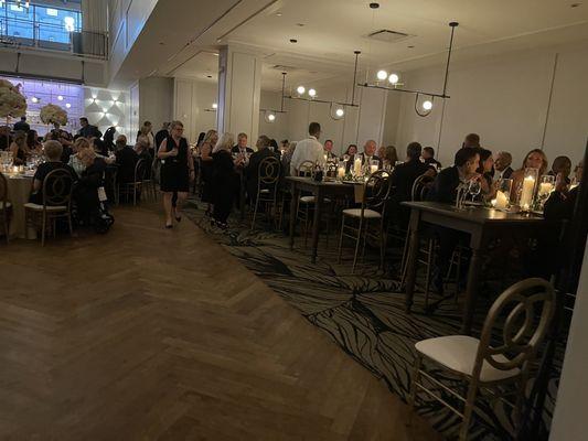 The tables on the right had curtains hiding them until after the ceremony that took place on the middle floor.