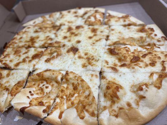 Large cheese pizza - no sauce ( allergy)