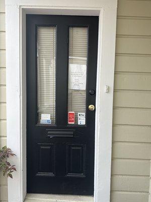 Front door, hard to find, locked and wouldn't answer the number or any of the other numbers online the first few tries.