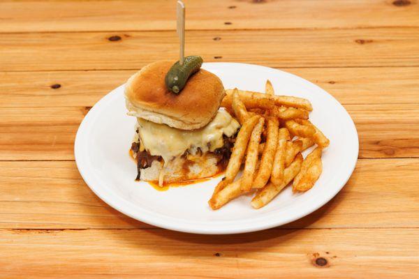 In House Longanisa Beef Burger . Toasted Pandesal . Mang Tomas Spread . Queso De Bola . Adobo Dusted Season Fries