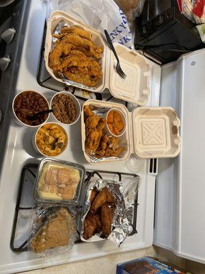 Catfish , red snapper, yams, dirty rice, red beans and rice , Mac & Cheese, cajun rub wings , banana pudding, and sweet potato pie!