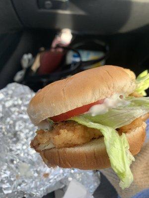 chicken sandwich woth lettuce, tomato, and Mayo