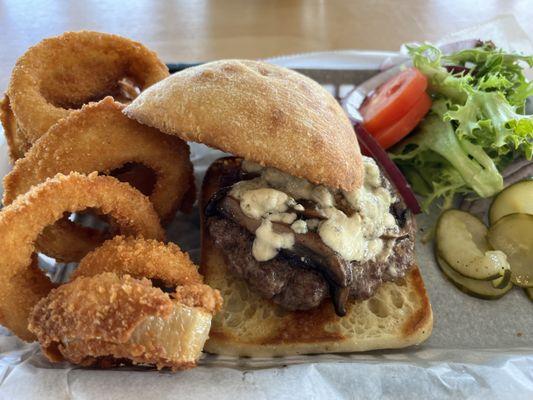 The Basic Burger served with onion rings!