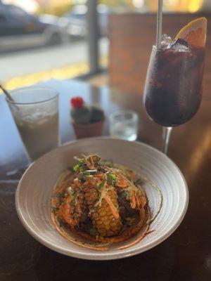 Elote Fried "Ribs" backed by horchata & sangria.