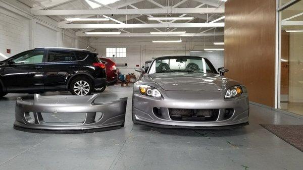 Before(damaged Amuse fiberglass front bumper)and after(brand new replacement).