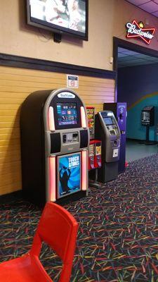 Atm, change machine for games, Juke box, entrance to bathrooms