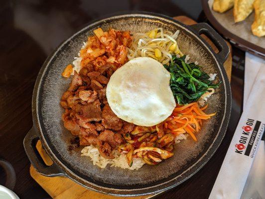 Dolsot bibimbap with spicy pork