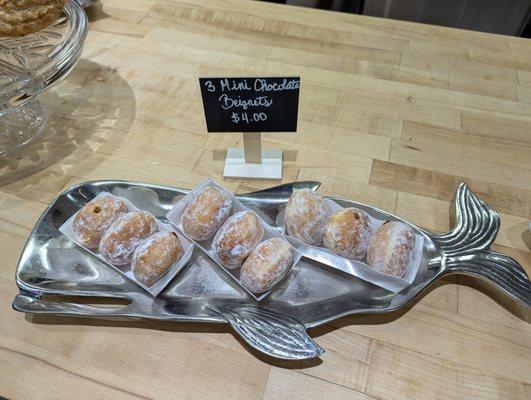 French beignets filled with different chocolates - selection varies