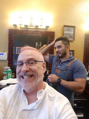 Getting a hair cut from the AMAZING Alfonso!