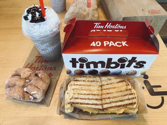 Medium Mocha Iced Capp, 40 Timbits, apple fritter, grilled cheese.