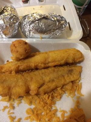 Crispy fish, warm hush puppies, and creamy baked potatoes from Captain D's. Love the crunchy bits.