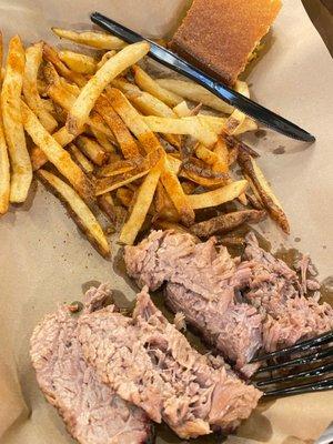 Moist beef brisket with Cajun seasoned fries.