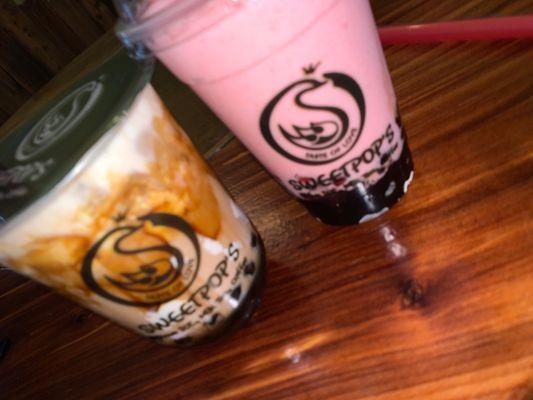 Black sugar milk tea and strawberry smoothie with boba