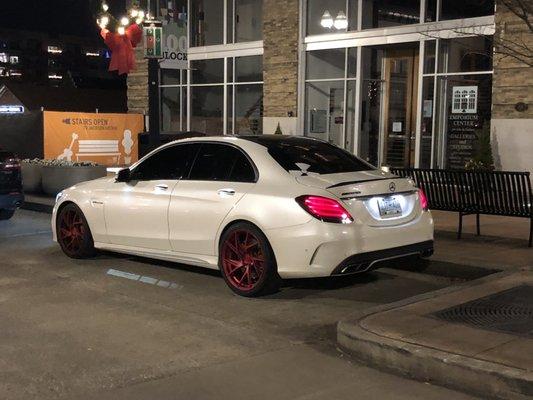 Window Tint and AMG puddle light install courtesy of Radioactive Car Audio.