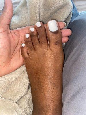 Regular white polish  from a jelly pedicure. Not very neat or precise in my opinion.