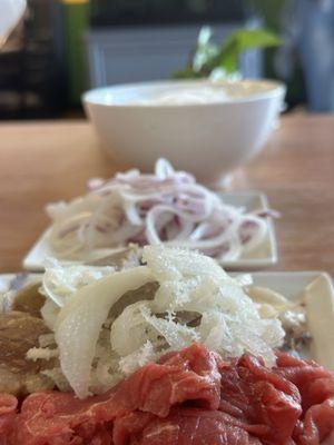 Hot stone pho comes with all the cuts