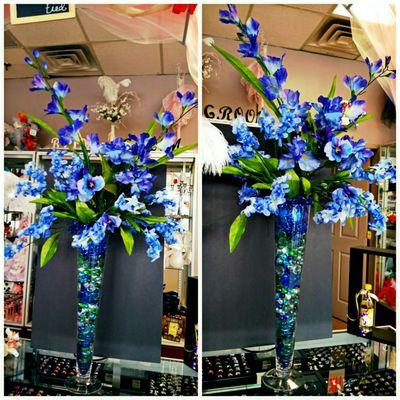 We carry rental center pieces which include set up and pick up delivery.  Many styles to choose from.